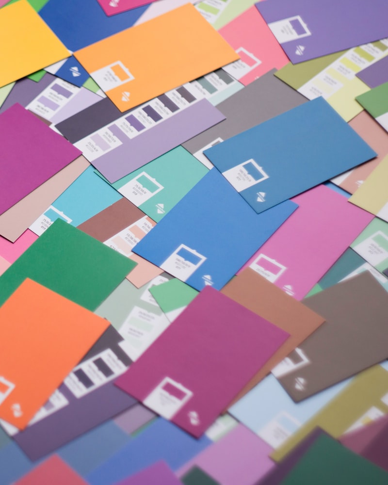 Color reference cards held against fabric — a custom color starts from the reference the buyer sends and is approved once at sampling