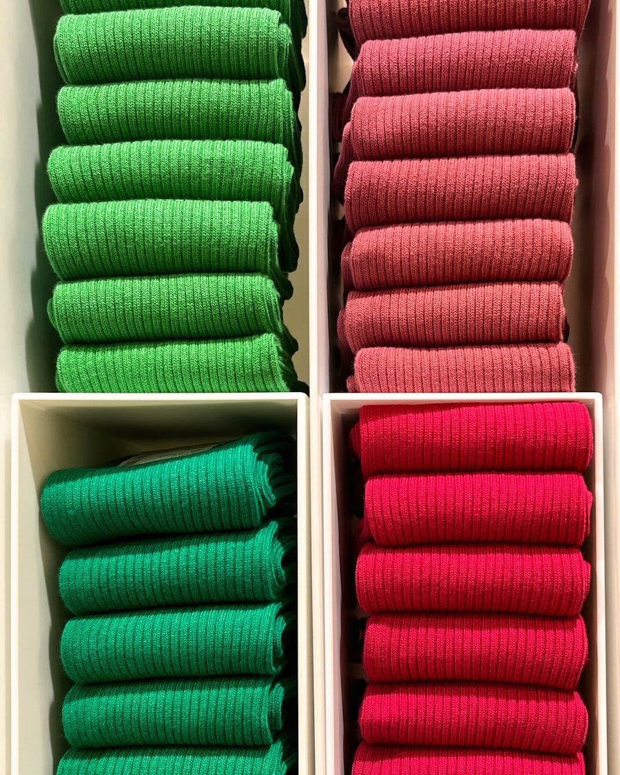 A first run folded and stacked by size — one style, one colorway, every size inside the same frame, jerseys carrying an invented club crest and two-digit numbers