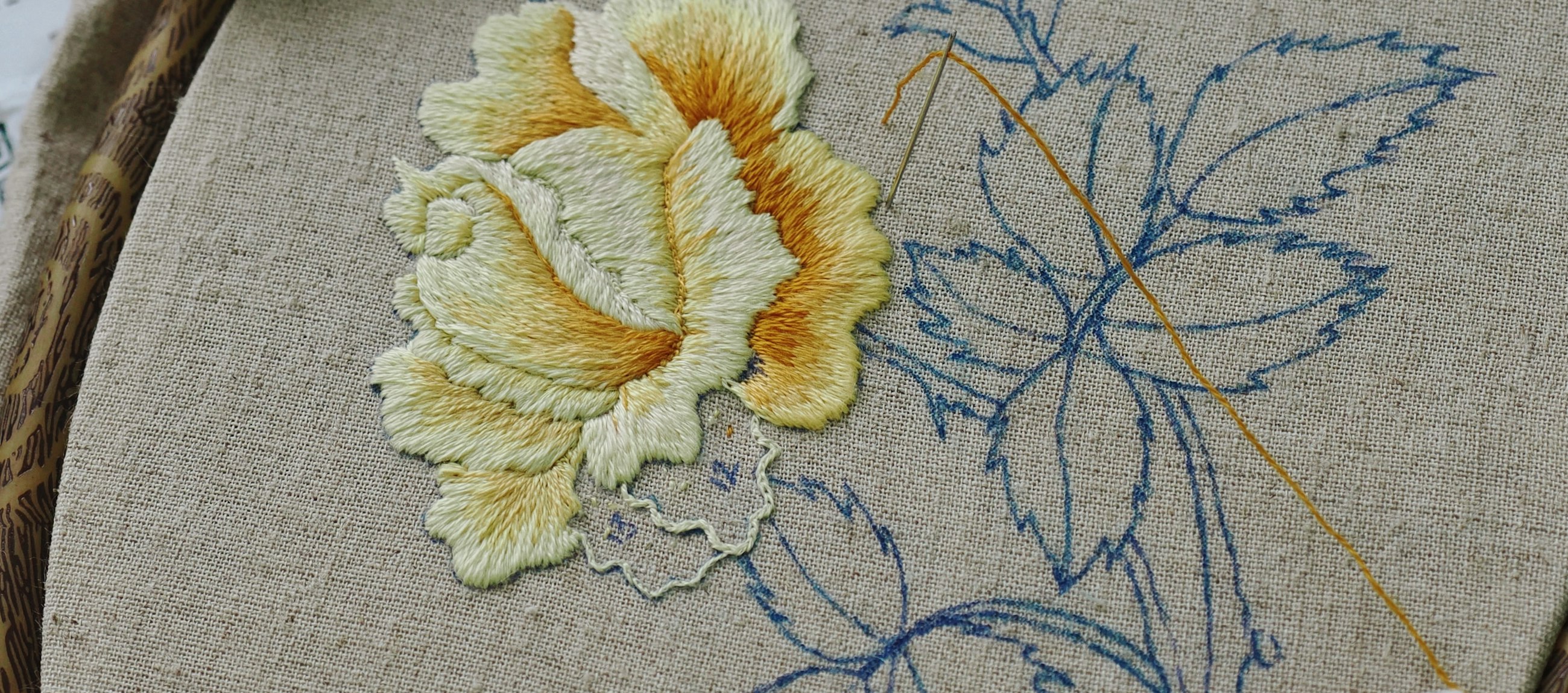 A garment pattern piece marked up with annotation lines during development