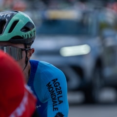 A cycling club team lined up in matching kit