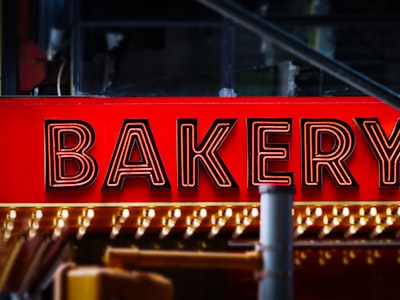 Round badge with laurels in warm bakery tones