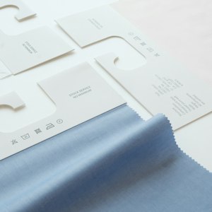 Packaging requirements factor: jerseys being folded into individual bags with labels