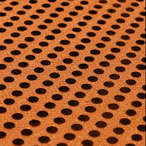 Player, women's and goalie cuts factor: jersey patterns in different cuts laid on a cutting table