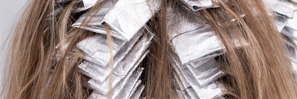 Custom wig specification parameters — hair types, cap constructions, lace grades, and color options at Source Wigs factory
