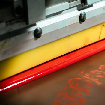 Screen printing close-up: a single-color number printed on a practice jersey