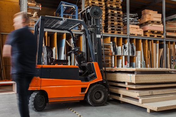 In-house inventory of labelled wall printer spare parts on stock shelves, kept ready to match to a customer machine