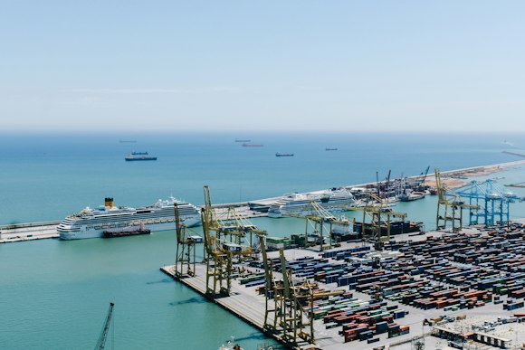 Container port with cranes and stacked containers