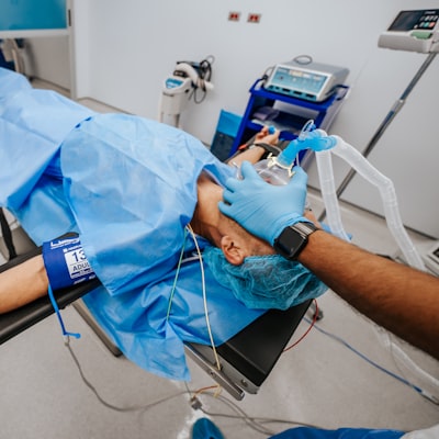 Gentle hands adjusting a medical wig into place with care
