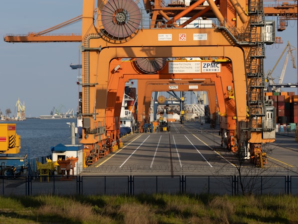 Export shipping containers being loaded