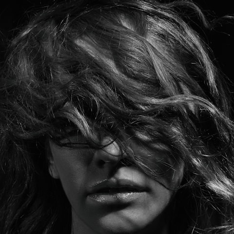 Deep wave wig texture closeup showing uniform S-curl pattern