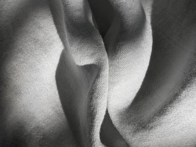 Silk base hair topper close-up showing realistic scalp simulation