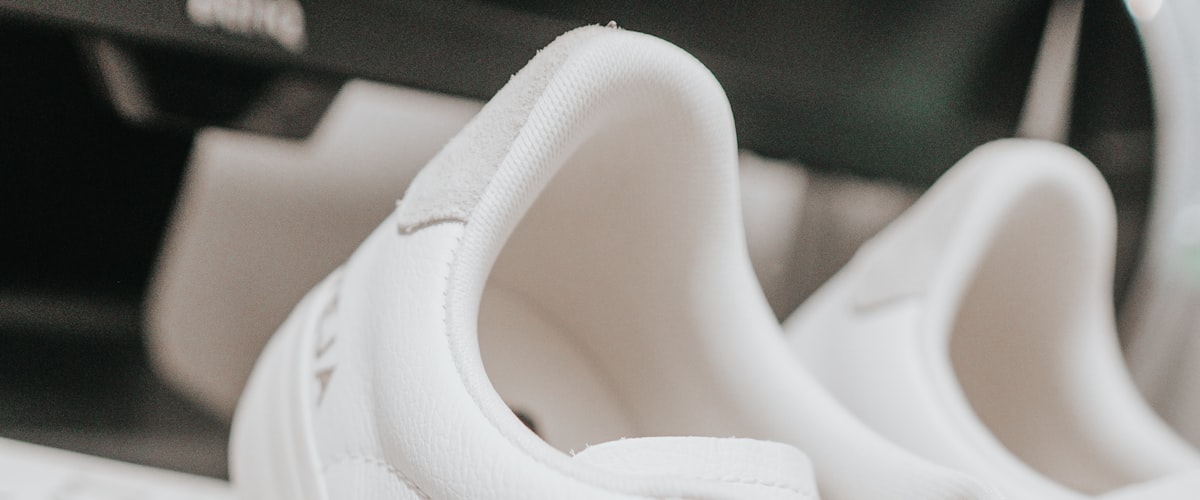 Featured sneakers on a minimalist pedestal