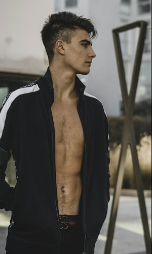Athletic fit warm-up jacket silhouette, trimmer through the body