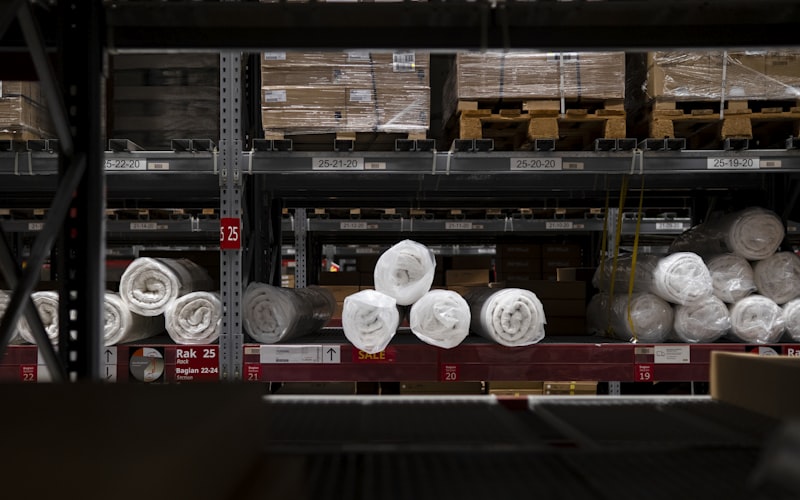 In-house supply-chain warehouse with certified performance fabric rolls