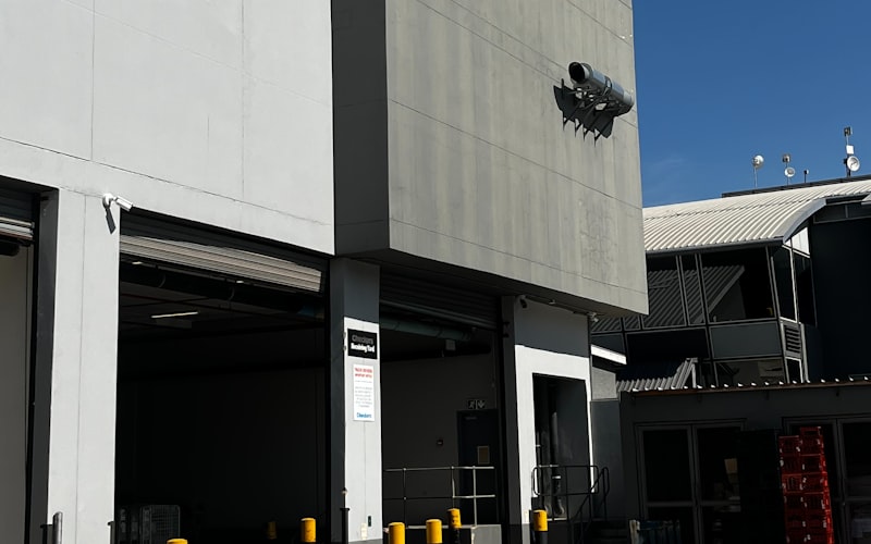 Cycling apparel warehouse with organised stock shelves ready for B2B shipment