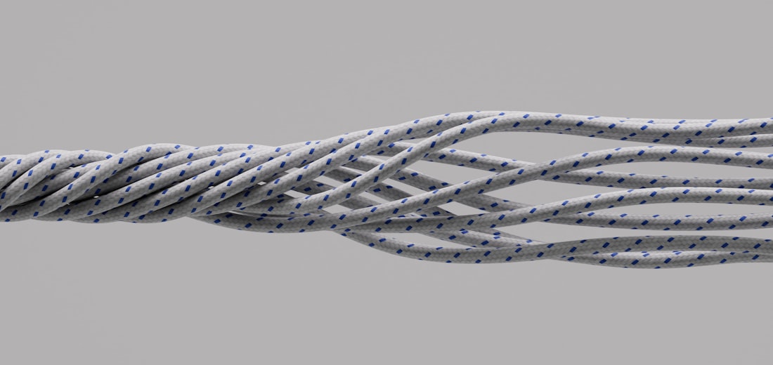 Four fibre cross-sections shown side by side at the same magnification: a surface coating, a microencapsulated print layer, an in-fibre system and an uncoated dyed fibre, drawn as generic material without any colour effect.