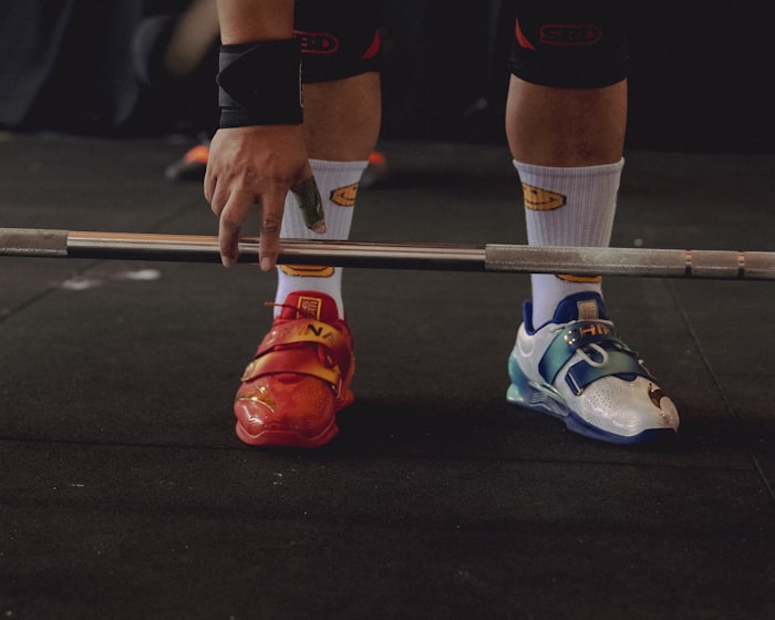 Blank white hockey socks laid flat, no crest, numbers, or wordmark.
