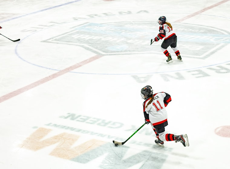 A youth hockey team on the ice in matched fictional team kits, jerseys socks and shells in one colorway