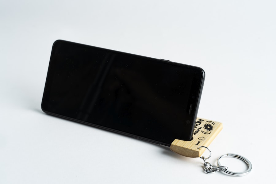 Ledger hardware wallet and phone on a desk for secure crypto management