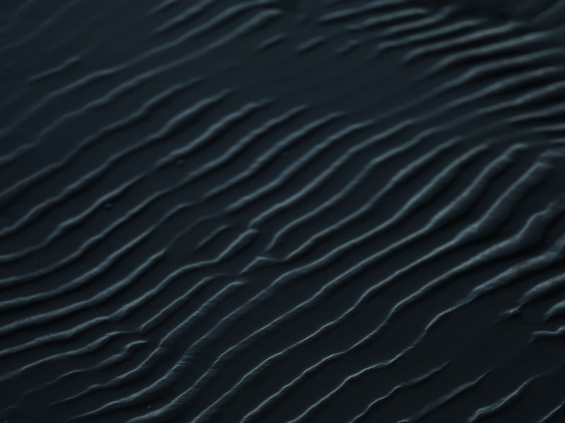 Deep wave hair texture macro closeup showing S-curl wave pattern