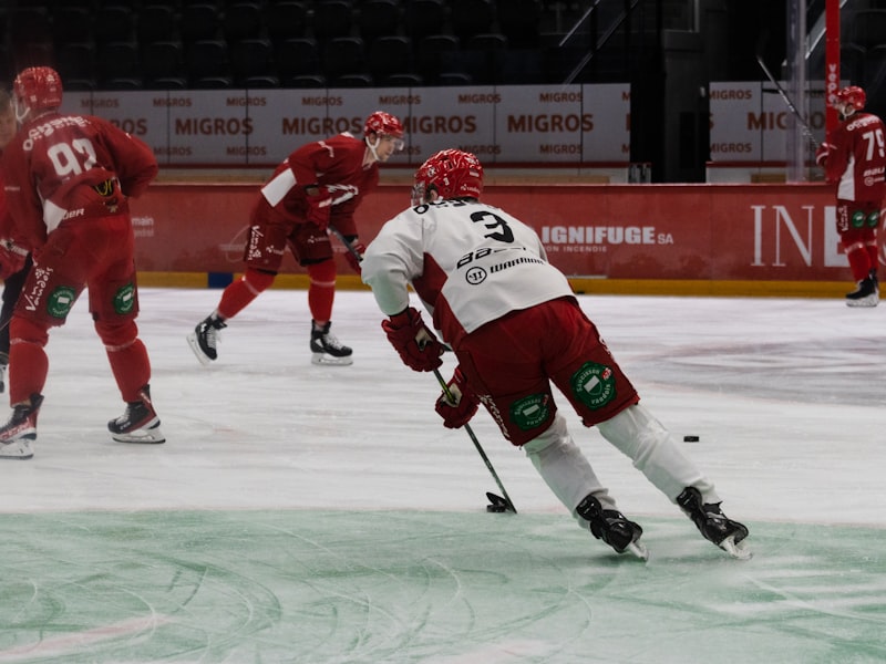 Women's hockey team gathered on the ice in matching custom jerseys