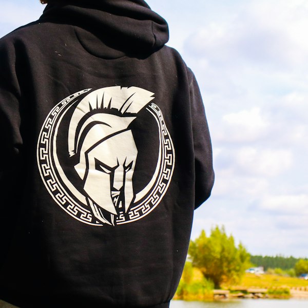 Full-zip hockey hoodie in team colors with contrast zipper and sleeve graphic