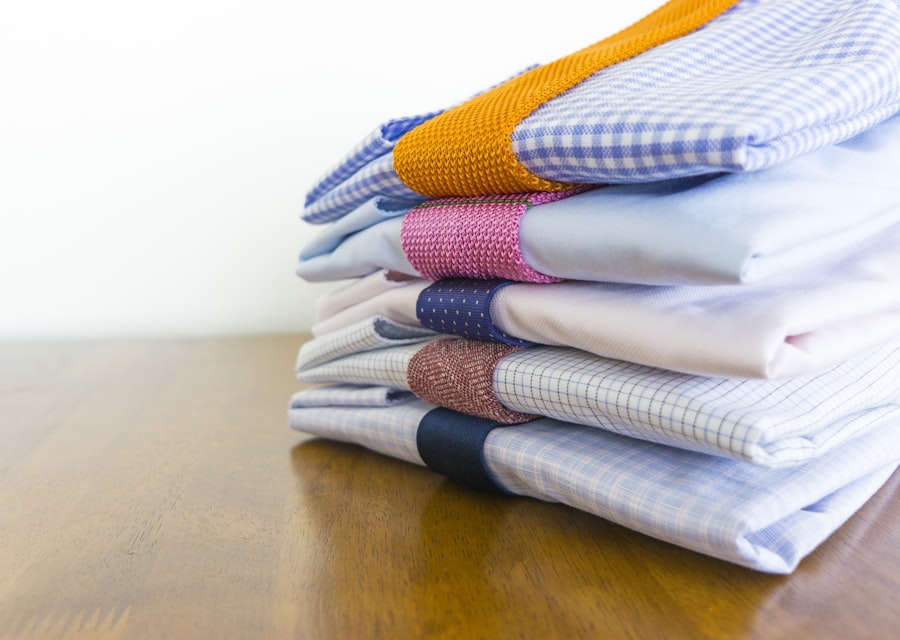 Replenished garments folded and stacked, matching the kit the buyer already has on hand