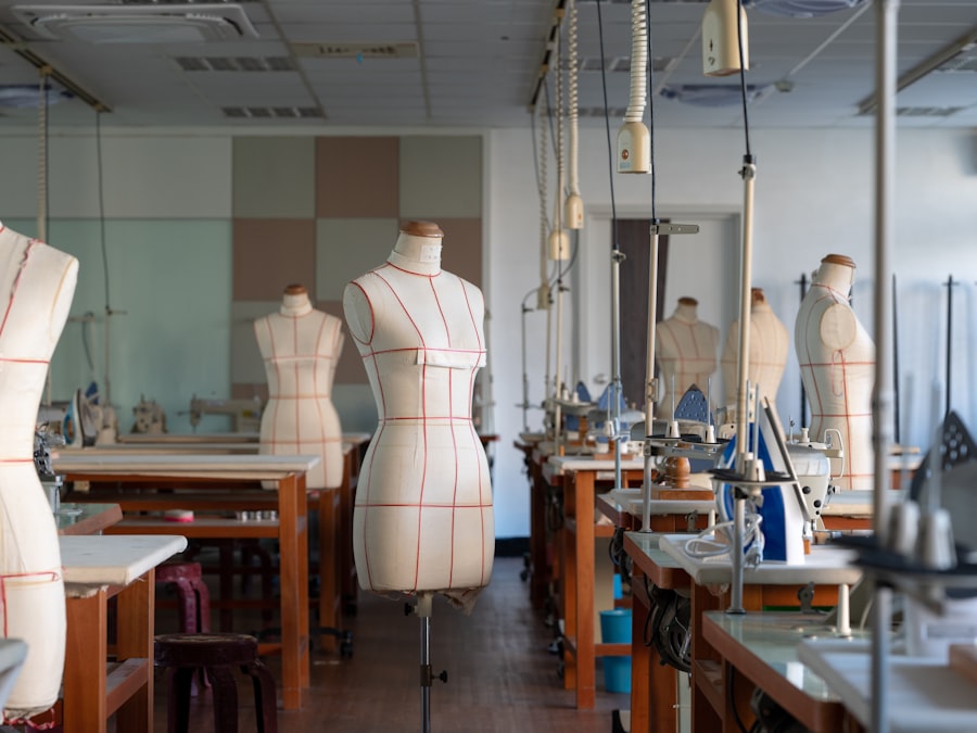 Dress forms wearing finished garments in the pattern room — the dressed state the jersey is sized for