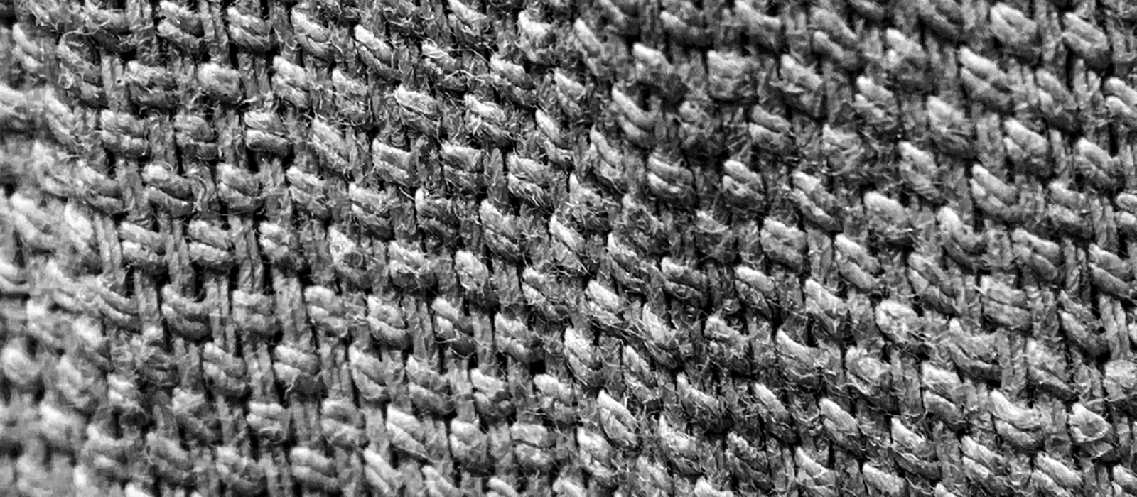 Diamond crotch gusset sewn into a hockey pant shell, flat overlock seams visible