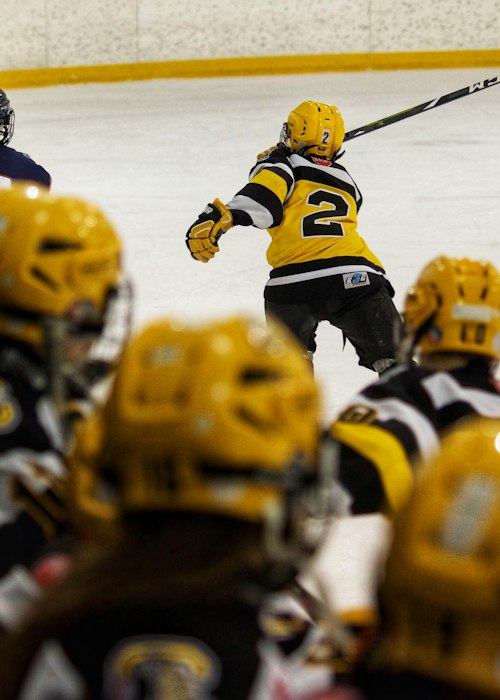 Player wearing a Standard Player Cut hockey jersey, straighter and longer through the body