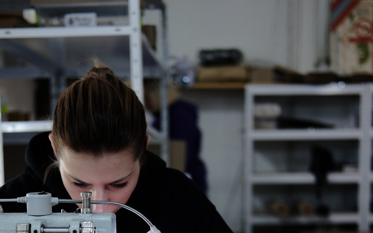 Printed garments moving through production — every sublimated design is sampled and approved before bulk