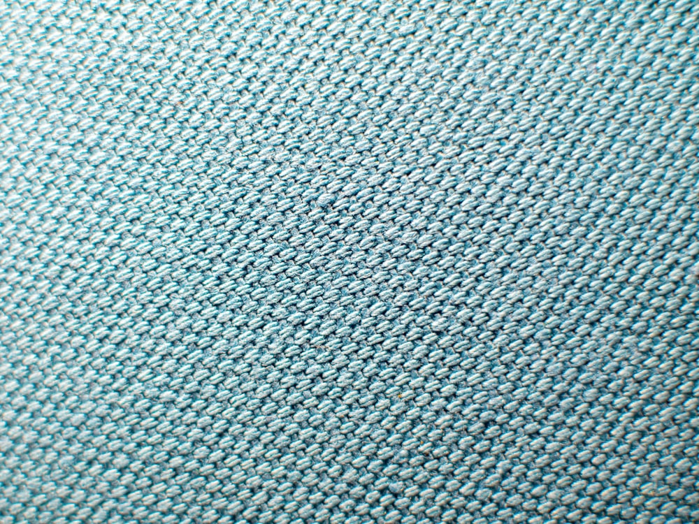 Home colorway fabric swatches held against the approved color reference