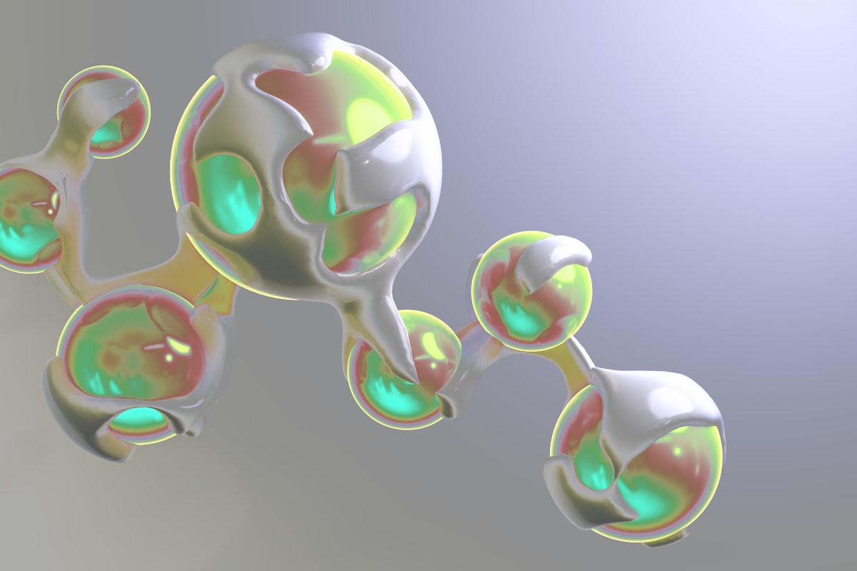 Diagram of reversible molecular rearrangement: a colourless state and a developed state joined by two-way arrows, an incoming ultraviolet ray, a return arrow labelled fades back on its own, and a wavelength axis marking the 320 to 400 nanometre band with a narrower 300 to 360 range highlighted.