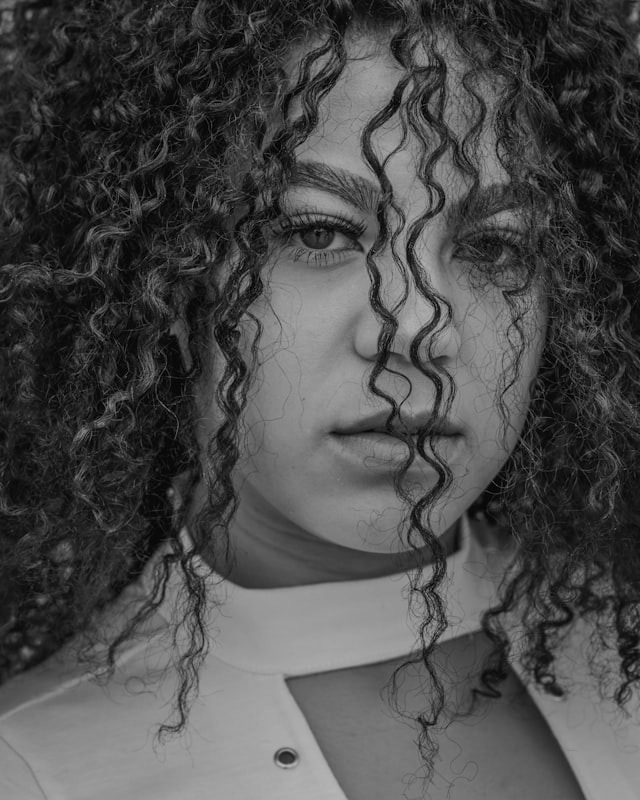 Deep wave wig in dry glam style with bouncy voluminous S-curls
