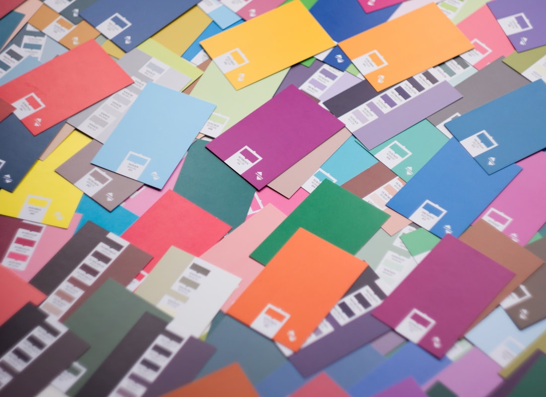 Fabric swatches in several team colorways laid out for material selection