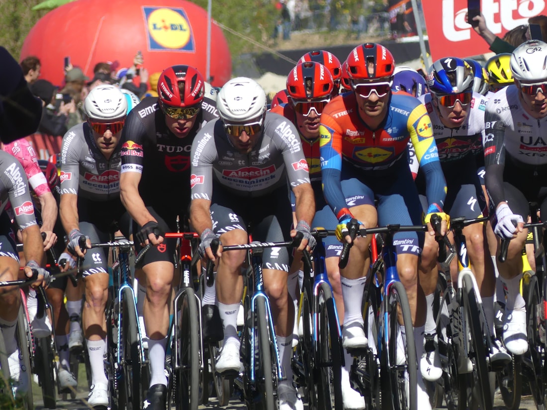 Riders gathered at the start line of a cycling event