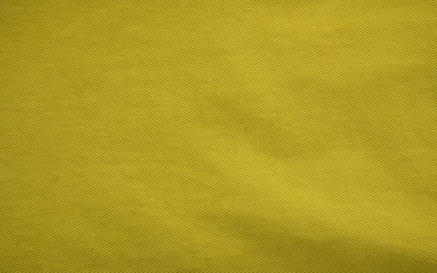 Close-up comparison of two decoration methods on fabric swatches