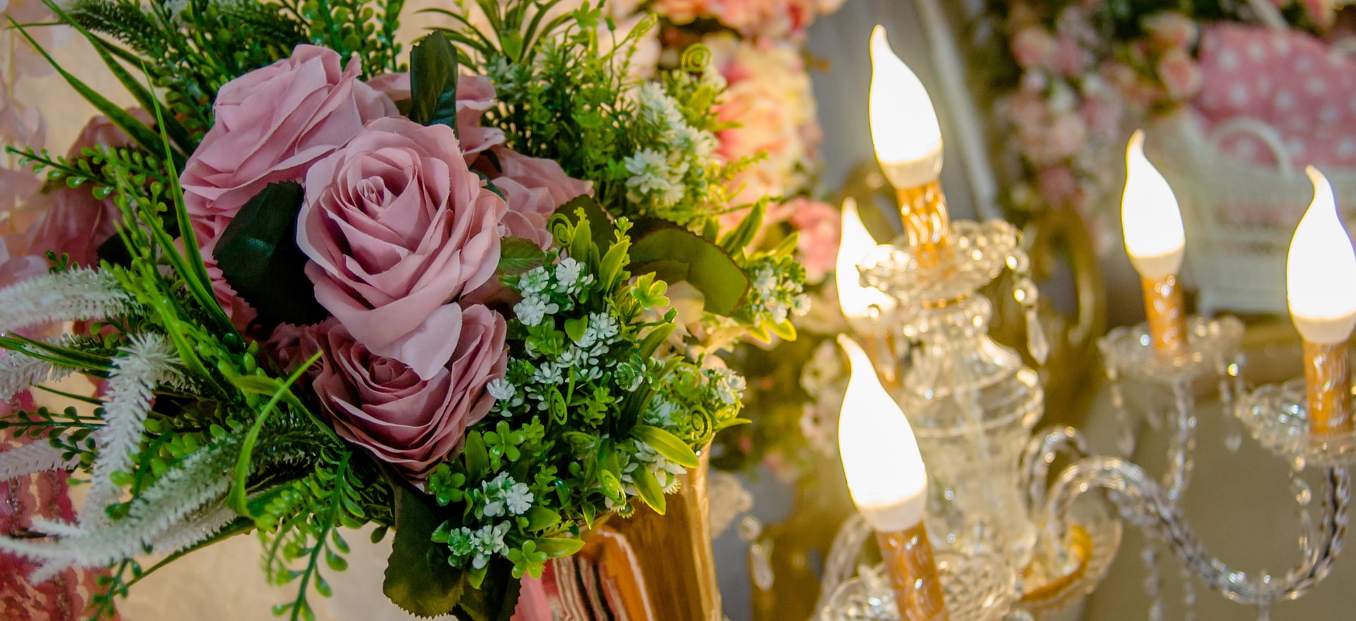 Elegant luxury wedding reception with gold accents and candlelight