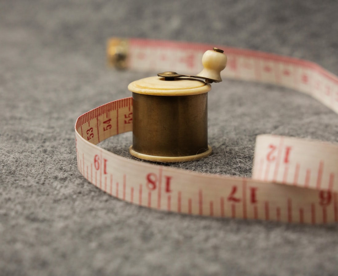 The marker checked against the confirmed size split before the cutter runs