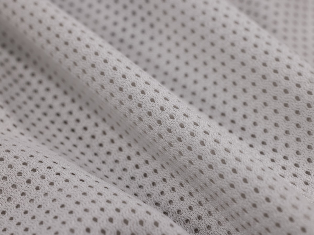 Close-up of lightweight moisture-wicking mesh cycling fabric