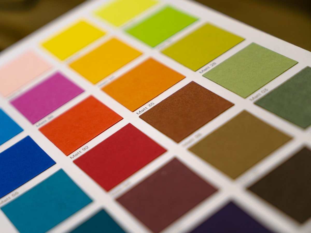 Color reference cards — color is matched against a coded reference or a physical sample, not against an on-screen appearance