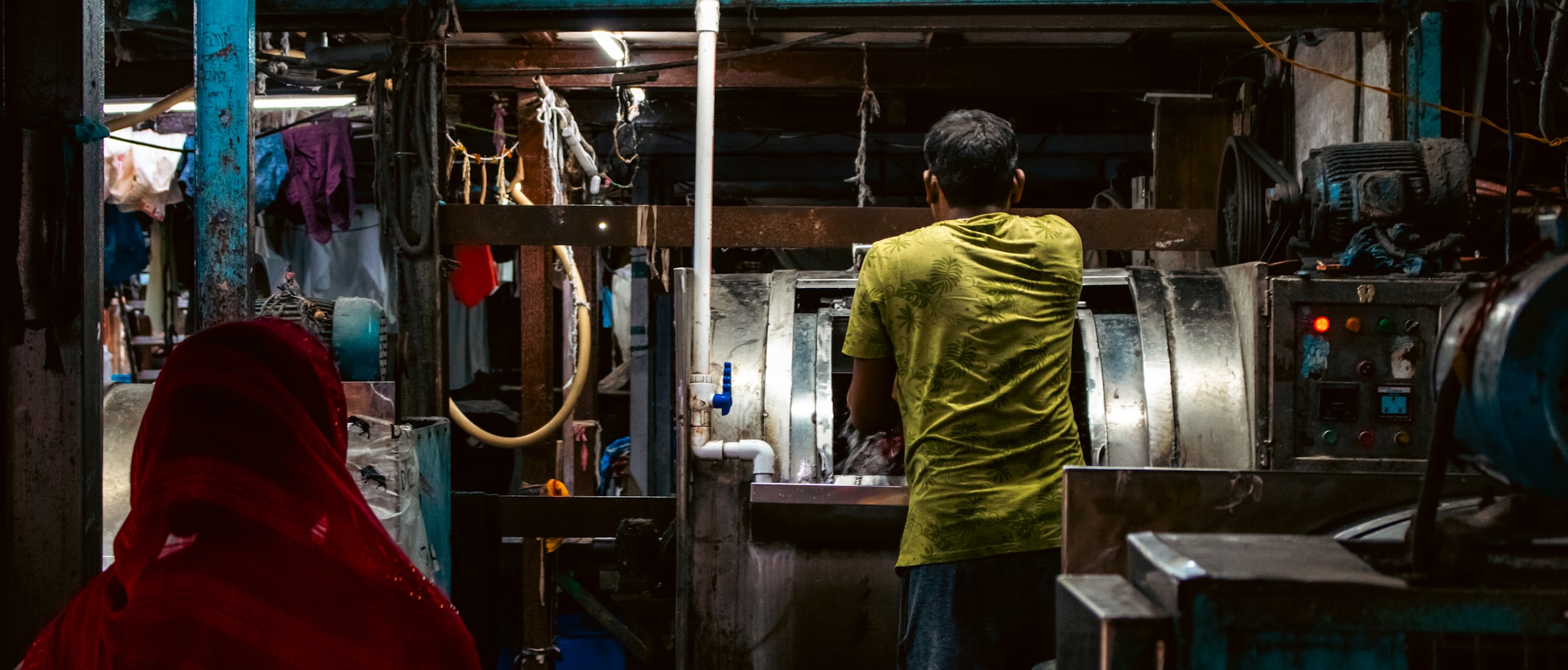 The production floor mid-run — a size change decided here is recorded for the next reorder, not forced into the current one