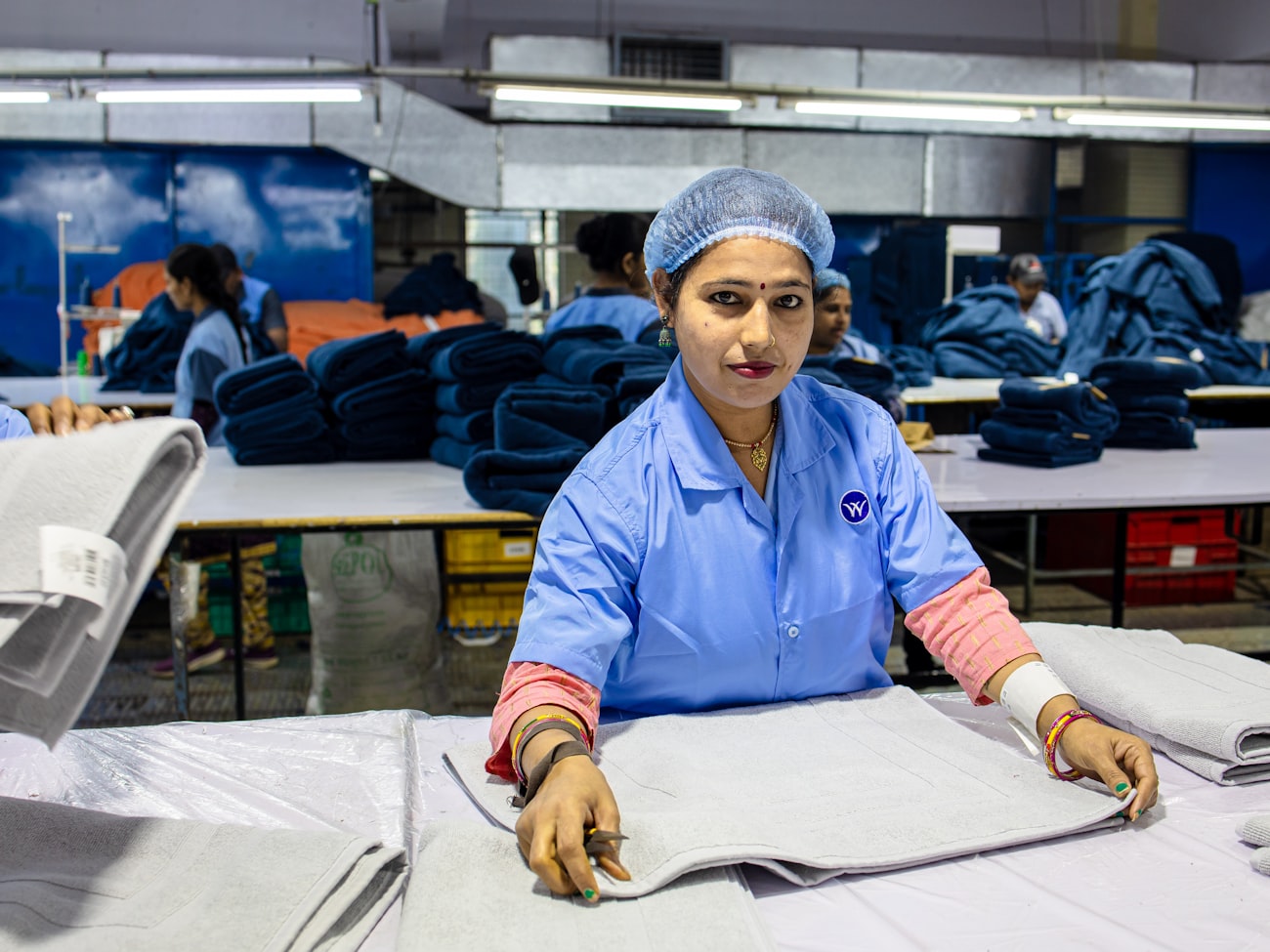 A sample garment packed for shipping — the first thing that crosses the border is one garment